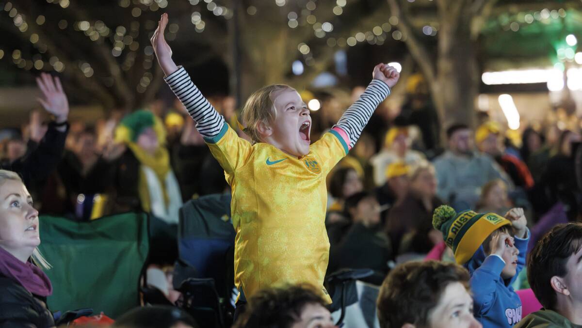 7 year old Matildas fan Addison Irvine reacts while watching Australia v France in the Women's World Cup. Picture by Keegan Carroll