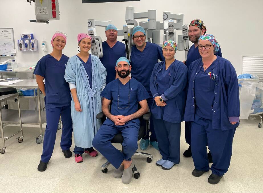 The surgical team from the first robotic gynaecological surgery at Port Macquarie Private Hospital including Dr Ashrafy (sitting, centre) and Dr Conrad (standing, fourth from left). Picture supplied by Port Macquarie Private Hospital. 
