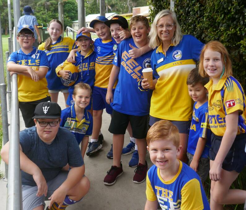 FANS FOR A GOOD CAUSE: St Joseph's Primary Laurieton students and staff. Photo: Supplied.