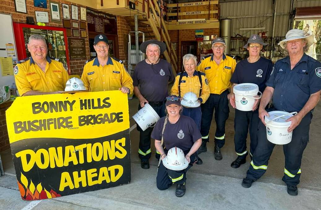 Bonny Hills Rural Fire Brigade members prepare for their annual bucket collection. Picture by Bonny Hills Rural Fire Brigade