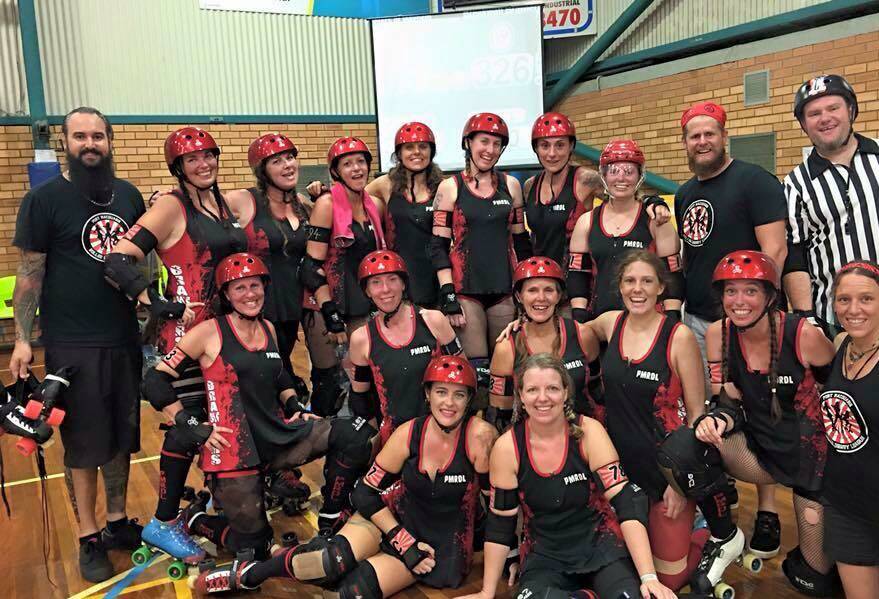 HAPPY BUNCH: All smiles off the court, the Port Macquarie Roller Derby League.
 Picture: Port Macquarie Roller Derby League Facebook page.