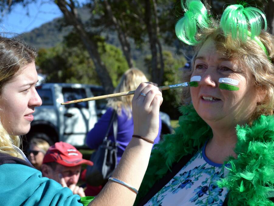 SUPPORT: There was plenty of home-crowd support for Camden Haven High, including deputy principal Sharon Westman who donned the school's colours.
